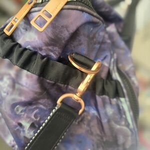 Lululemon Athletica Purple and Black Backpack with Gold Accents